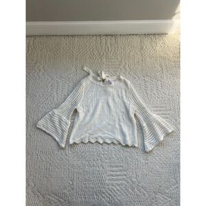 white crochet bell sleeve sweater